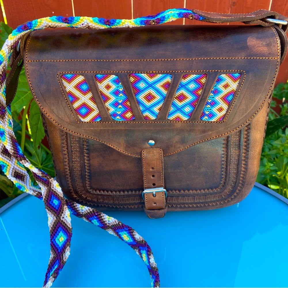110 Hand-tooled leather bag with handwoven strap. Join us live